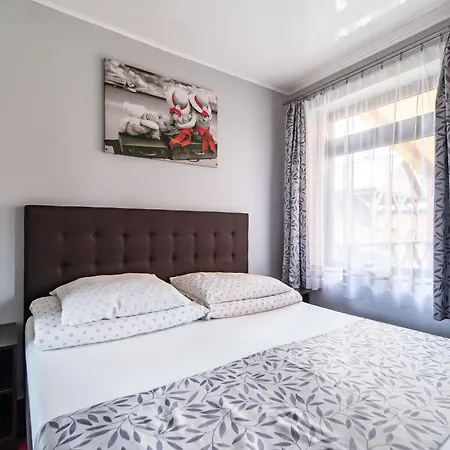 Деревянный коттедж Letniskowe Bursztynek