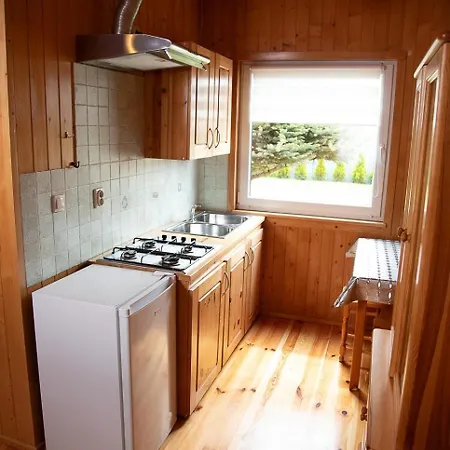 Letniskowe Bursztynek Деревянный коттедж *