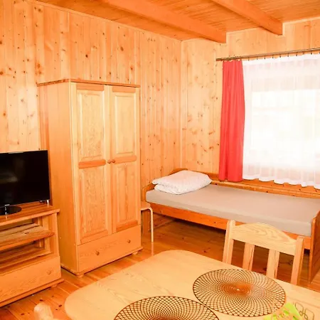 Деревянный коттедж Letniskowe Bursztynek