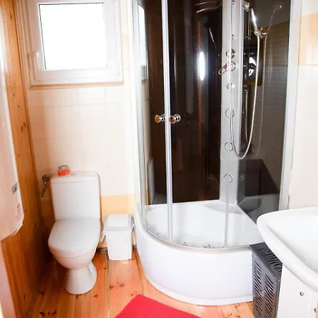 Letniskowe Bursztynek Деревянный коттедж *