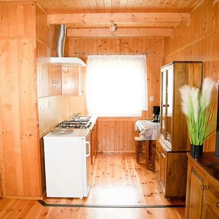 Letniskowe Bursztynek Деревянный коттедж *