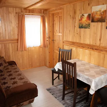 Letniskowe Bursztynek Деревянный коттедж *